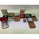 A box of working alarm clocks + lighters