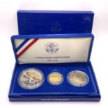 A 1986 United States cased Liberty coin set to inc