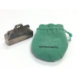 A miniature Tiffany & Co silver clutch bag, approx