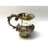 A mid-Victorian silver christening mug, embossed a