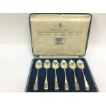 A cased set of six silver spoons, each from a diff