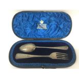 A cased silver fork and spoon set by Mappin & Webb