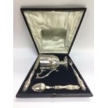 A fine quality cased silver christening set compri