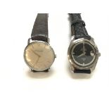 Two vintage gents watches including a Titoni air master and a Tho Russell and sons. Both seen