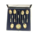 A cased set of six silver apostle spoons, sugar ni