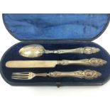 A cased silver knife, fork and spoon set by Richar