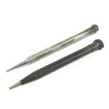 A pair of sterling silver propelling pencils. Post