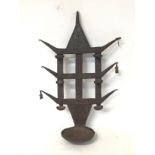 Wrought iron benin lamp, 54cm tall.