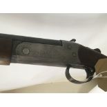 An unusual.410 single barrel shot gun with fixed silencer Maker Cooey Canada model 84 serial