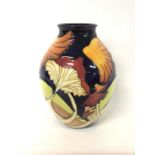 Moorcroft mushroom vase, approximately 21cm tall.