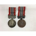 Two long service fire brigade medals. One awarded