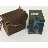 A Vintage Beau Brownie camera with an unusual enamelled Art Deco design lens front with two tone