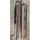 Various vintage walking sticks, umbrella, gold clu