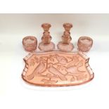 A rare pattern peach glass dressing table set, pos