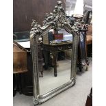 A mahogany corner cupboard together with a large modern classical style framed mirror