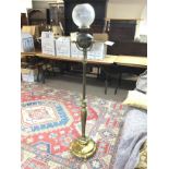 Vintage brass telescopic electric lamp with a fros