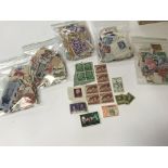 3 boxes of assorted stamps