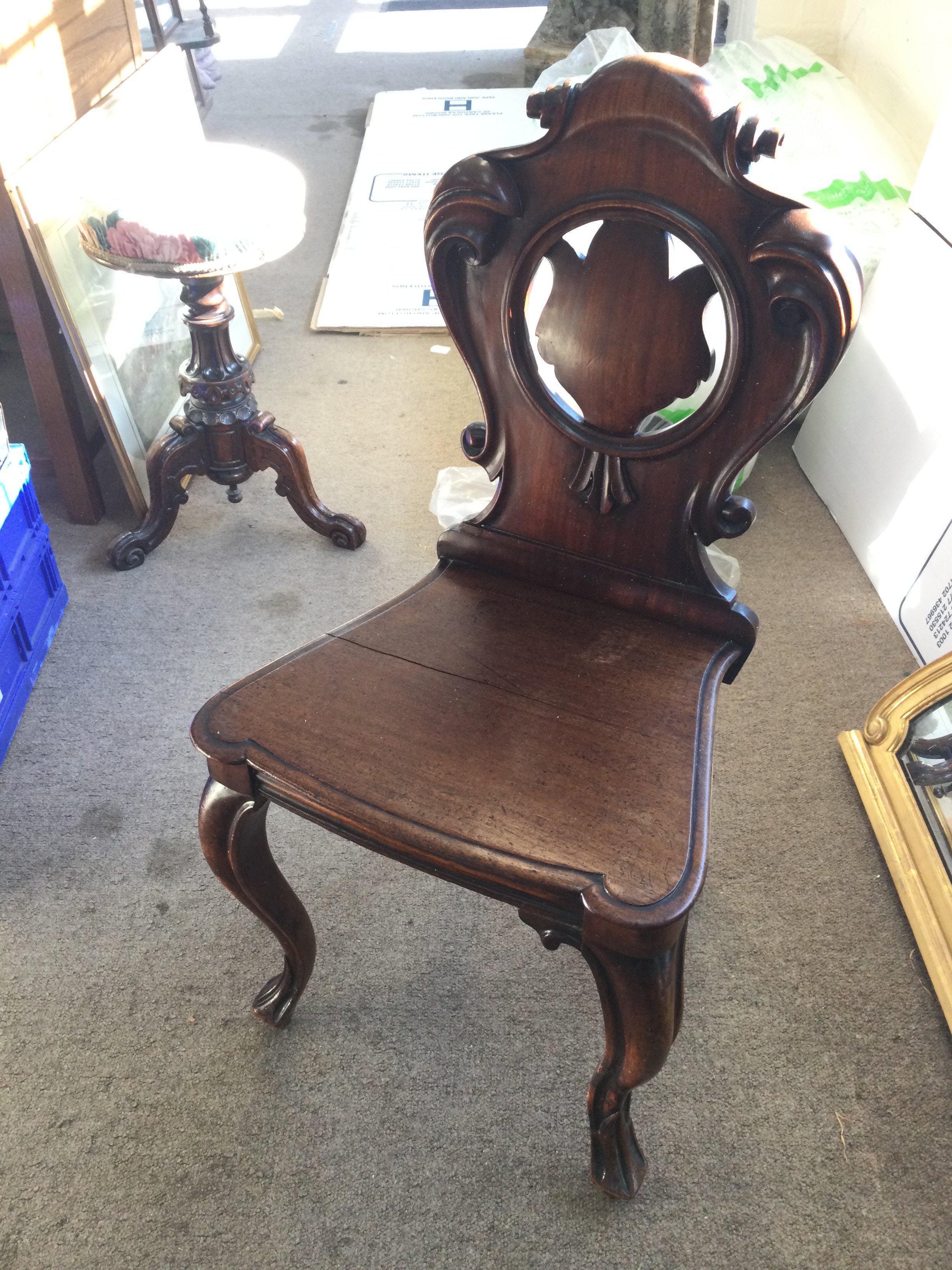 A Victorian Mahogany hall chair, in need of restor