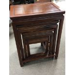 A nest of four Mahogany Chinese influence graduati