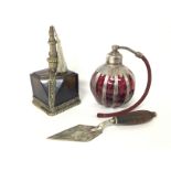 Unusual perfume bottles and a small decorative sil