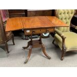 An Edwardian inlaid tea table with folding top, on