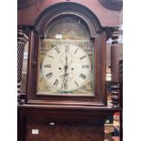 A Victorian mahogany Scottish long case clock the painted arched dial with Roman numerals