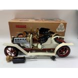 A vintage Mamod motor car with the original box and accessories.