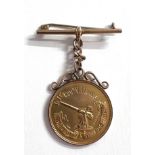 A WW1 civilian issued 9ct gold medal, issued by Th