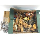 A box of vintage wooden items including various no