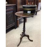 A mahogany wine table and an oak brass bound plant