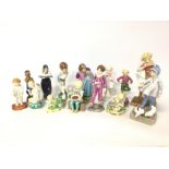 A collection of Royal Worcester figures in good co