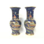 Pair of Carlton ware vases, approximate heights of