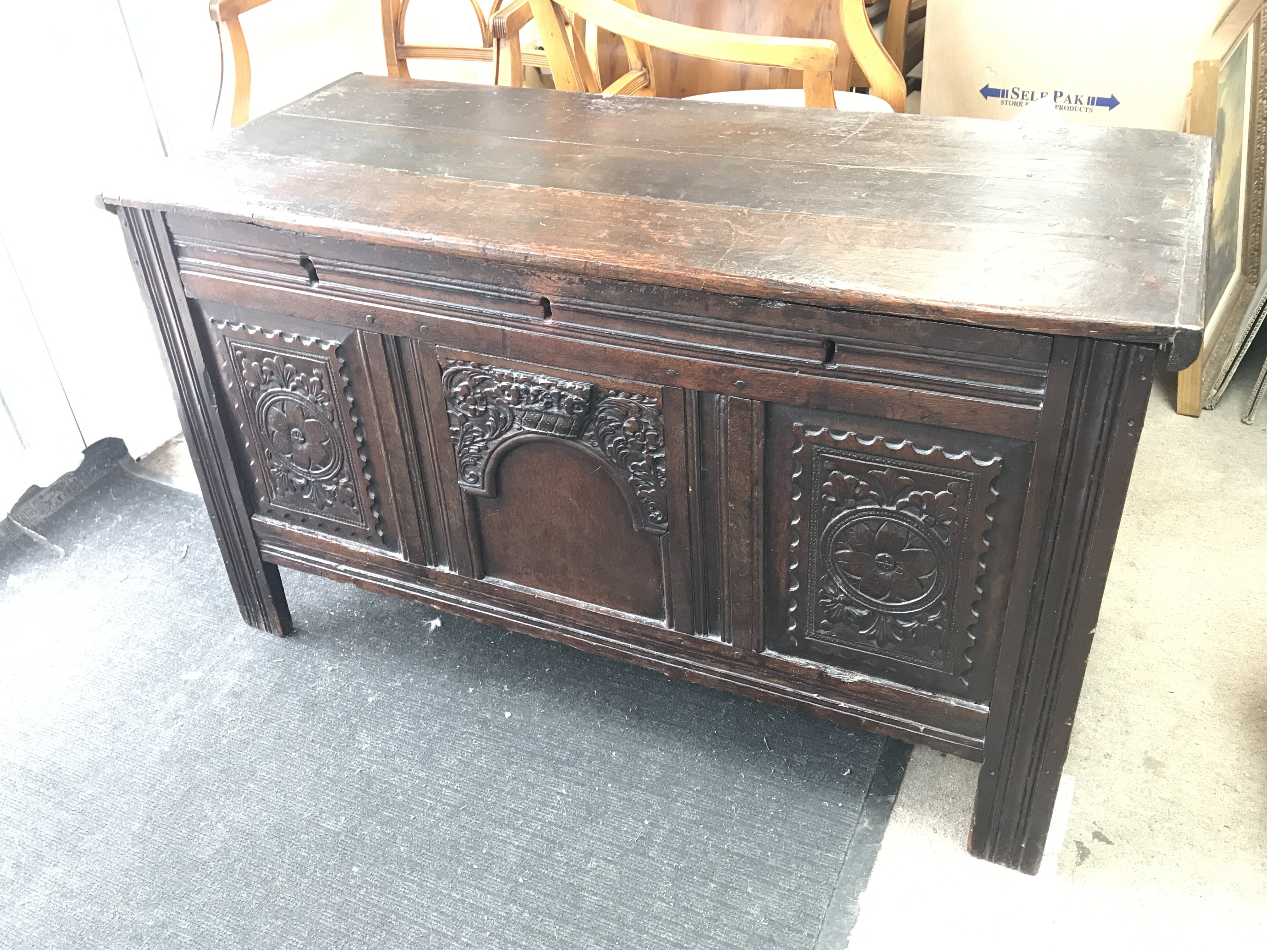 Stained oak early 18th century chest with floral c