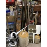 A collection of vintage gardening tools a Vintage walnut car dashboard galvanised watering cans