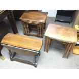 A collection of small tables including an oak nest