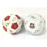 Two signed footballs by West Ham and Liverpool clu