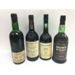 Four bottles of vintage port comprising a 1970 bot