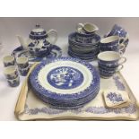 A collection of blue and white dinnerware in Old W