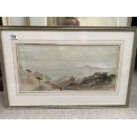 A framed watercolour depicting Mediterranean seasc