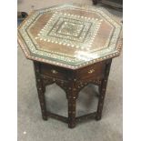 Indian bone inlaid folding table, 52cm tall. Posta