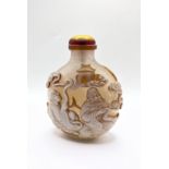 A finely carved 2 layer cameo table snuff bottle d