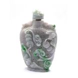 A large apple green and white finely carved jadeit