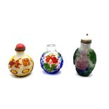 3 multicoloured cameo glass snuff bottles, tallest