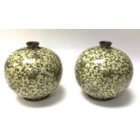 A pair of ovoid form cloisonne enamel decorated va