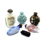 A small collection of snuff bottles to include sma