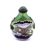A hand blow 2 layered cameo glass snuff bottle wit