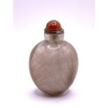 An ovoid form hairs fur rock crystal snuff bottle.
