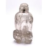 A carved translucent rock crystal snuff bottle sup