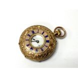 A 9ct gold button wind pocket watch with enamel fa