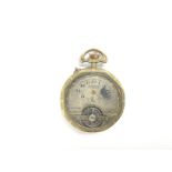 A brass cased Amida patent pocket watch with ornat